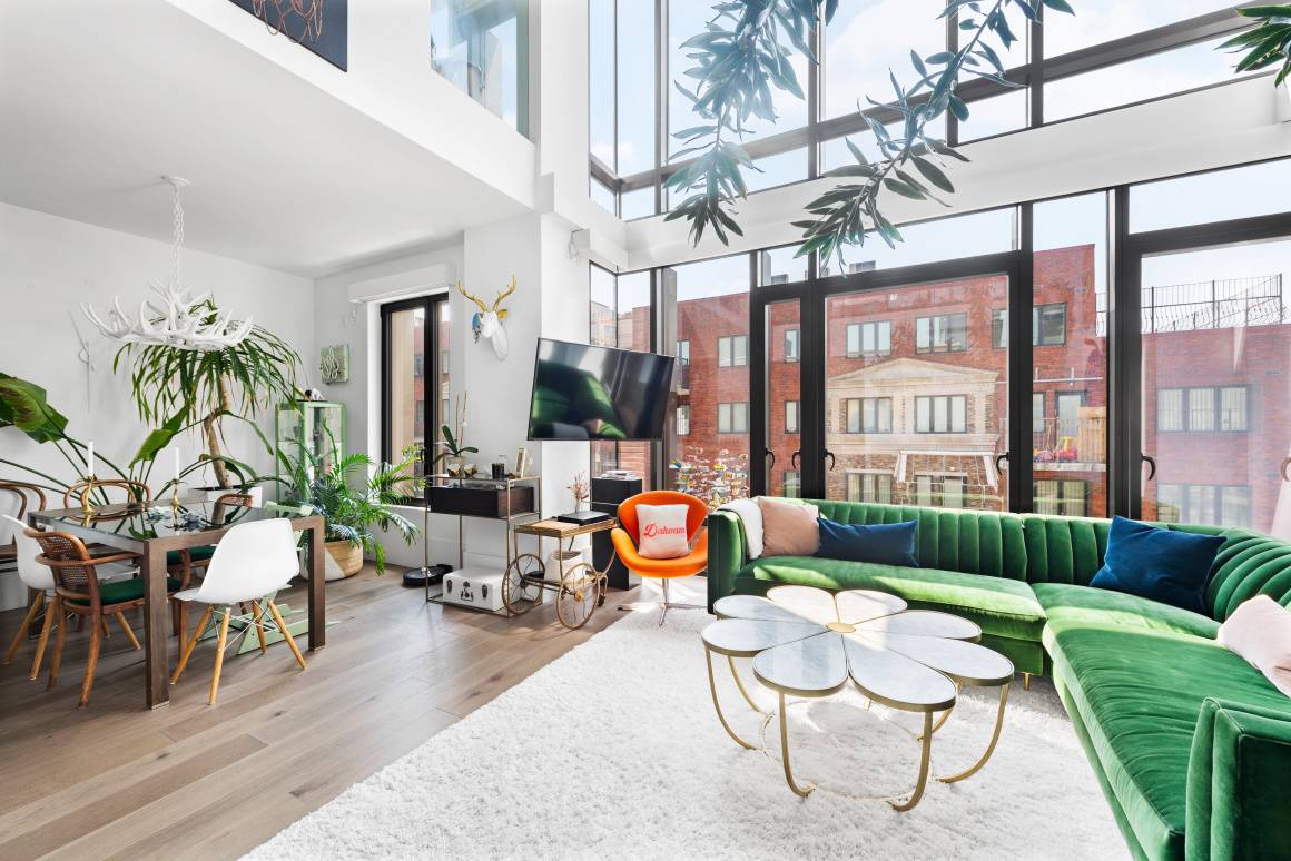 Spectacularly chic duplex perfectly positioned in the esteemed Oosten condominium.