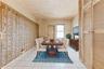 Dining area featuring crown molding and light tile patterned floors