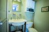 Bathroom featuring toilet and a sink