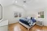 Bedroom with light wood finished floors, vaulted ceiling, recessed lighting, and ceiling fan