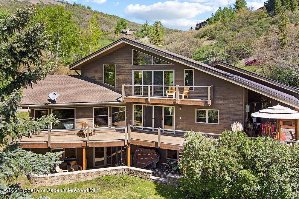 Located in upper Melton Ranch and offering far reaching views of Snowmass ski area from every level, sits a private, inviting and comfortable home sure to check many boxes.