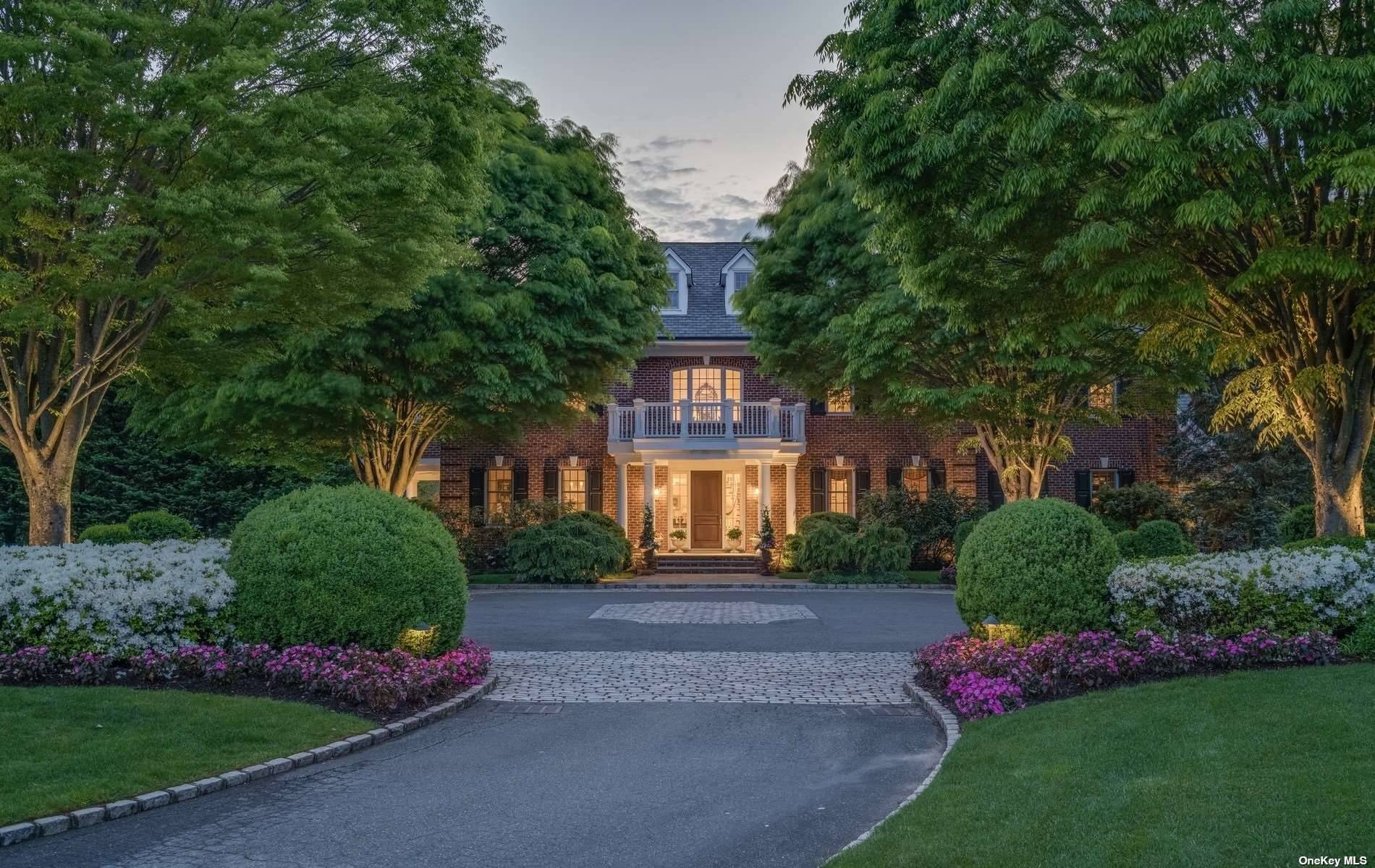 Exceptional Seven Bedroom Center Hall Colonial boasts rich architectural details, timeless appeal and high end finishes.