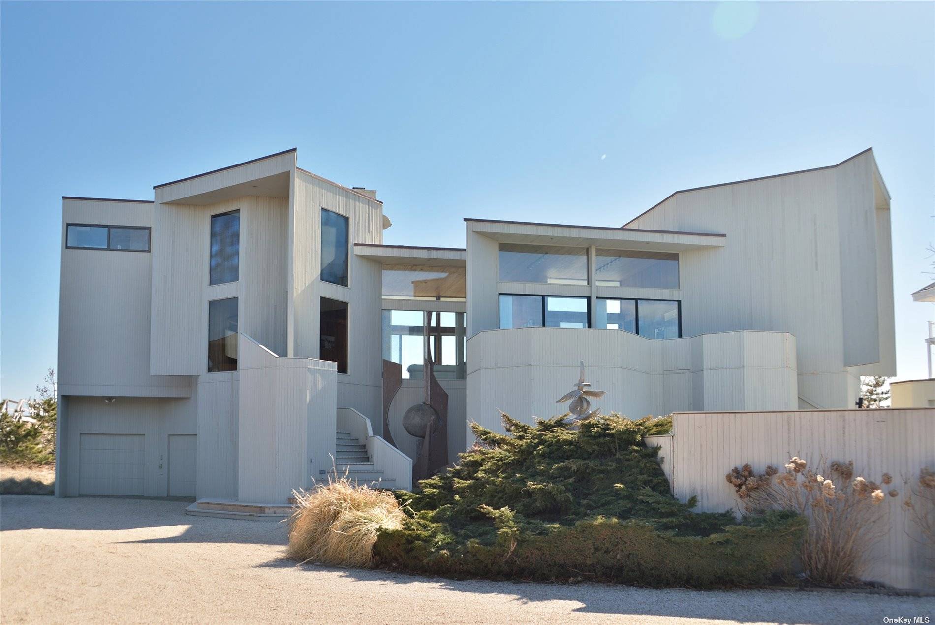 Residing between the bridges and on one of the best ocean front parcels on Dune Road this home boasts incredible ocean views and is jetty protected.