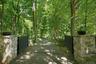 Automated steelgated ½ mile long paved driveway provides both a secure entrance and a meandering romanticdrive to the interior compound