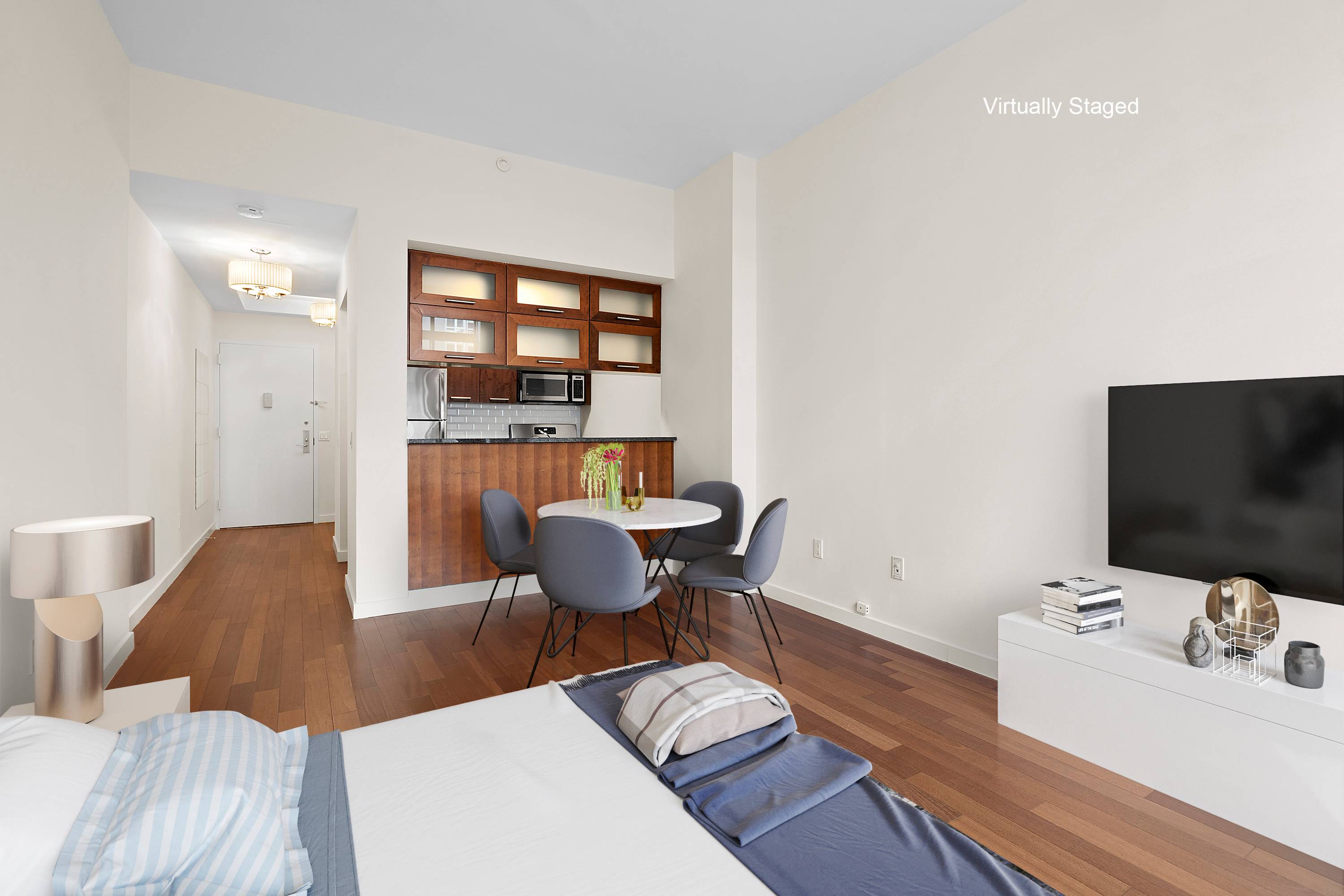 Welcome home to this impressive studio at the ideally located Crossing 23rd condominium.