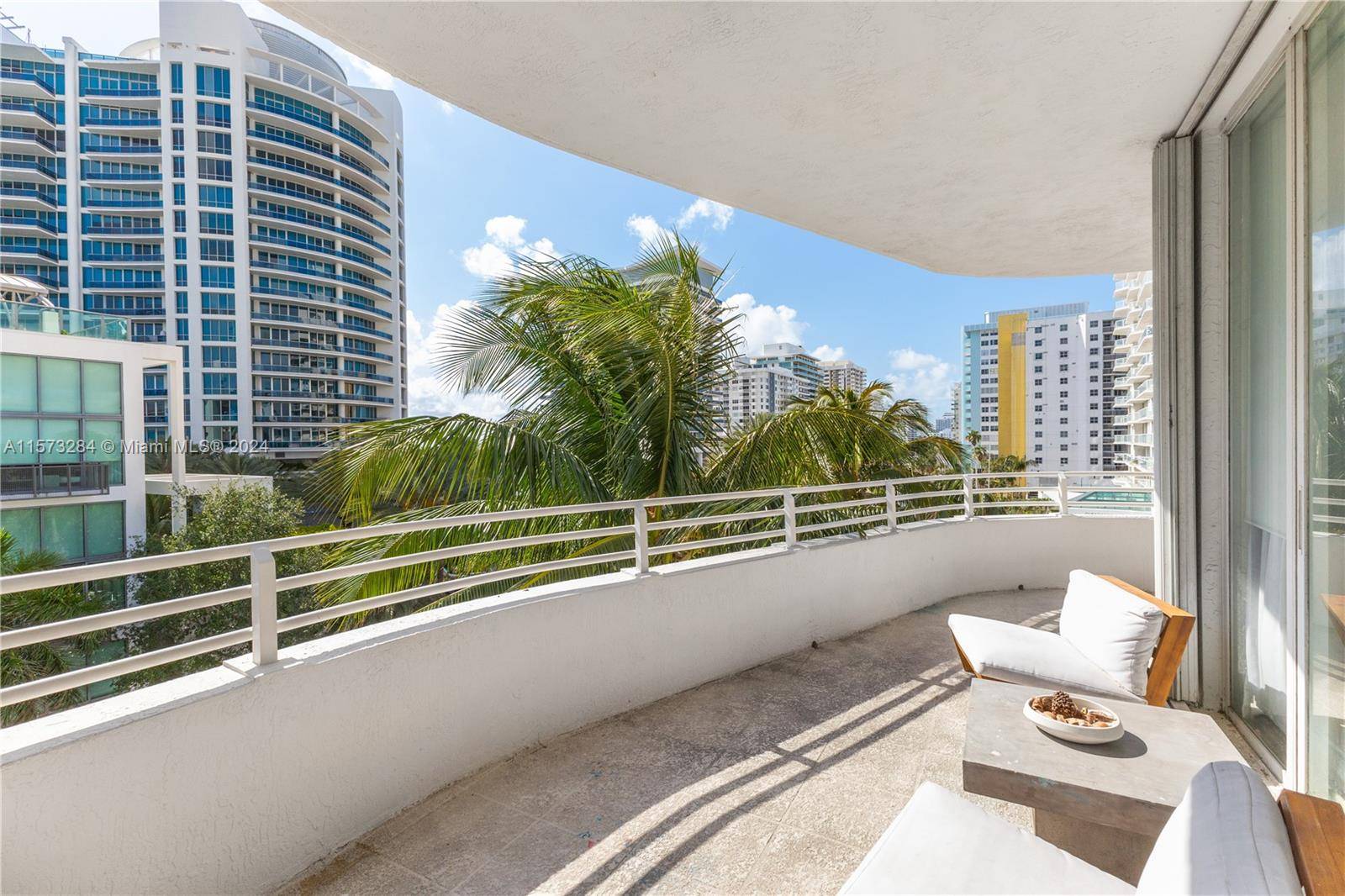 Gorgeous spacious three bedroom, three bathroom corner w high ceilings, floor to ceiling glass, two terraces including large wraparound w beautiful water views.