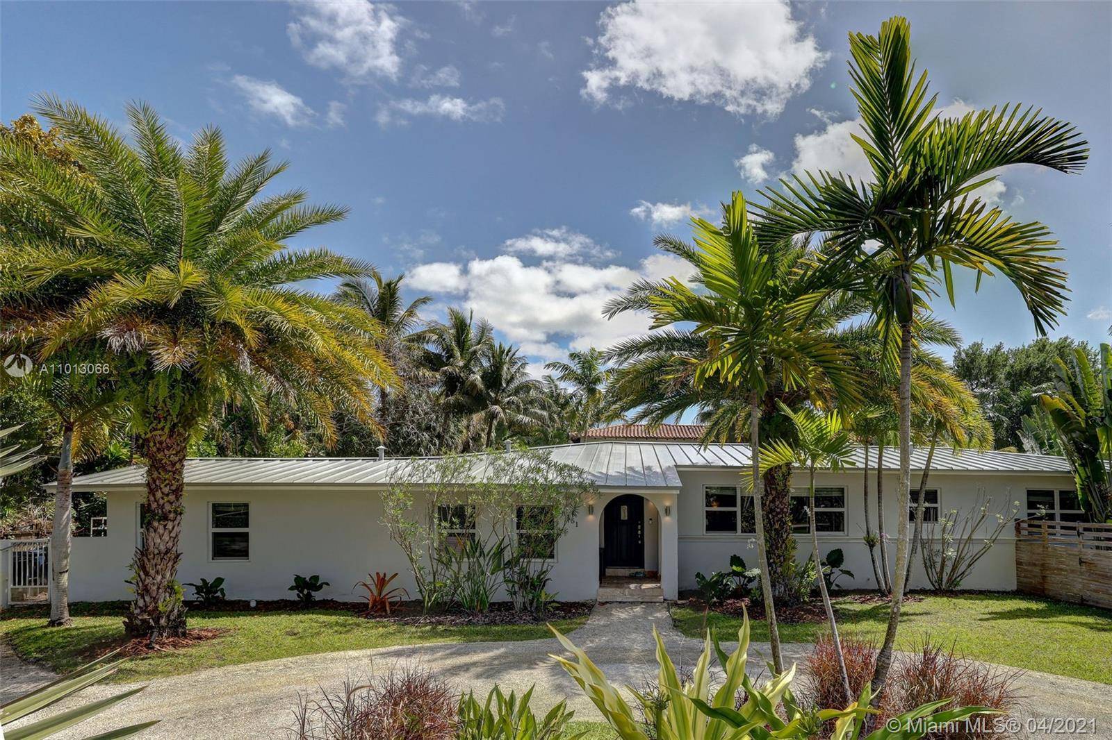 Live the South Florida lifestyle in this exquisitely renovated 4 bedrooms, 3 baths South Miami home, nestled onto a 14, 300 beautifully landscaped lot with oversized pool and wood deck.