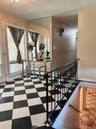 Staircase featuring tile patterned floors