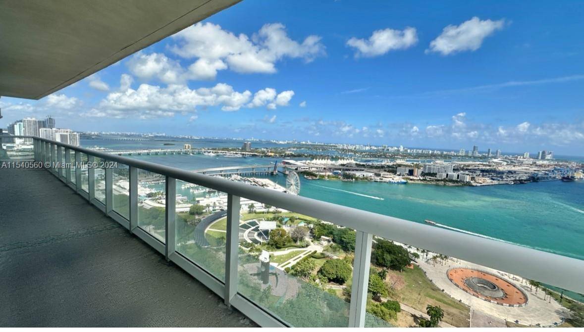 Step into luxury living at this 3 bed, 2 bath condo in downtown Miami's iconic 50 Biscayne.