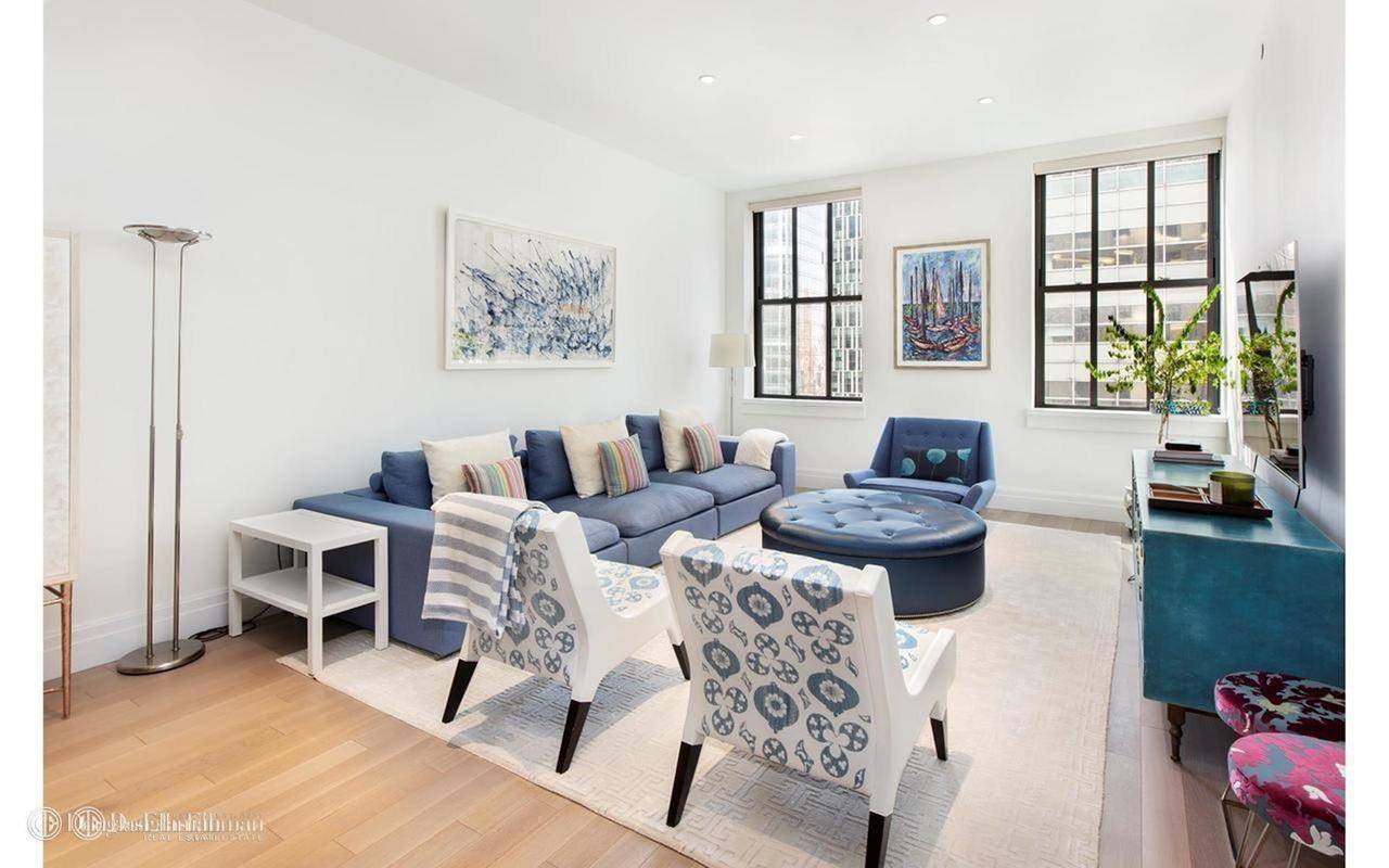 This gorgeous split two bedroom, two and a half bath plus home office residence spans 1, 588 square feet in the historic Ralph Walker building at 100 Barclay in Tribeca.