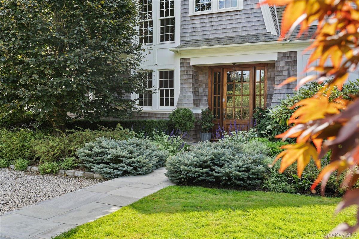 Property entrance featuring a yard
