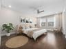 2nd bedroom with engineered hardwood floors and view of the park , fountain, and Tampa!