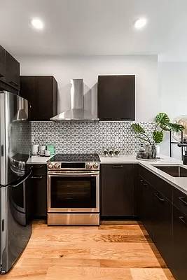 Beautiful 2 bedroom, 1 bath residence featuring stainless steel appliances, in unit washer dryer, marble bathrooms, and spacious closets with open Southern facing views.