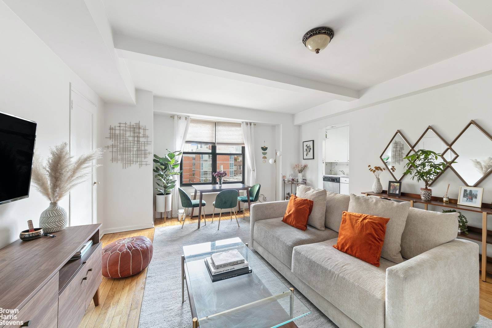 Spacious high floor junior 1BD in prized Art Deco coop with 9 foot beamed ceilings, hardwood floors, foyer, and bright northern exposures with sweeping skyline and Empire State Building views.