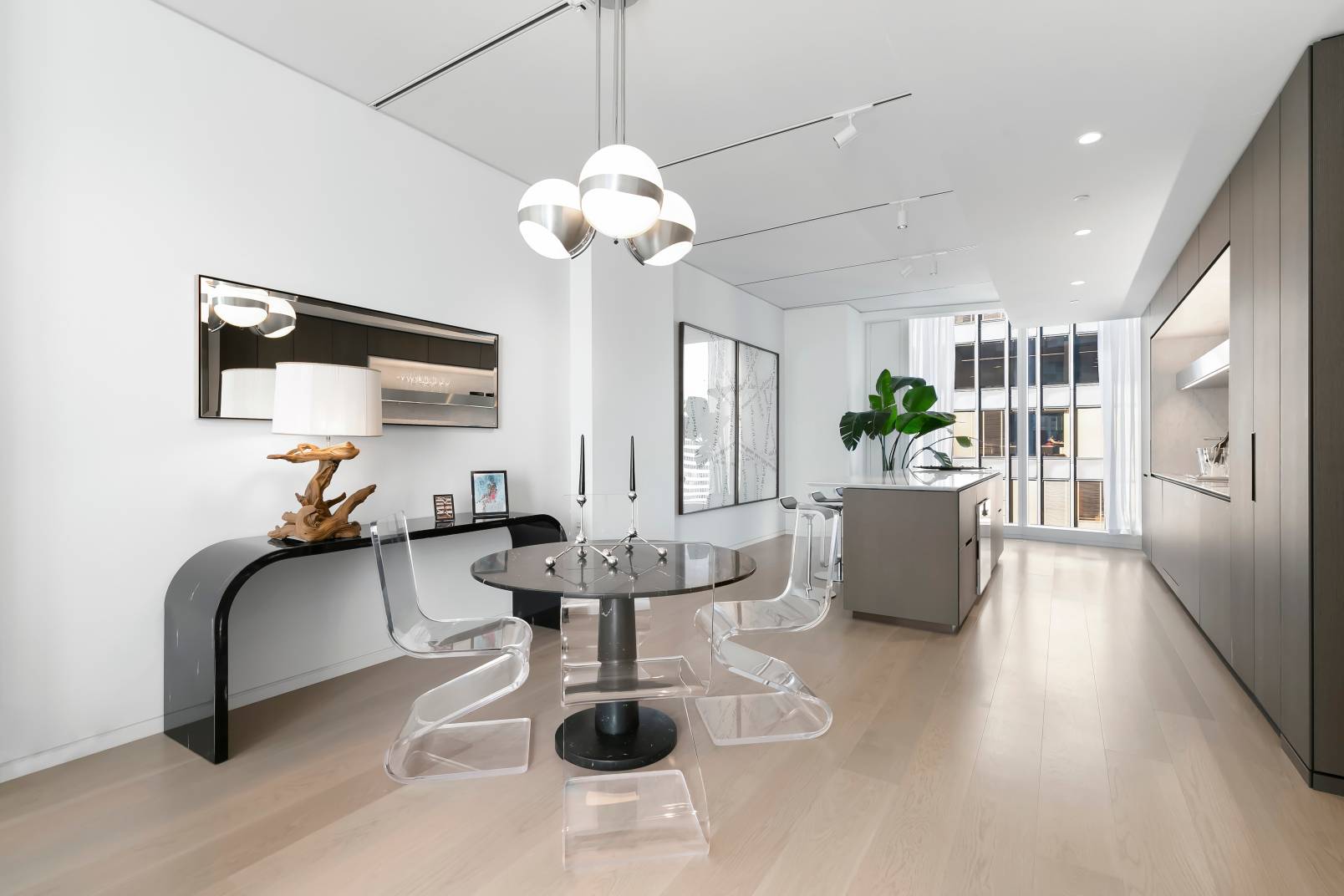 Immediate Occupancy On site Sales Gallery and Model Residences by Appointment An elegant oak entry door welcomes you to this extraordinary 1, 375 SF one bedroom residence situated in the ...