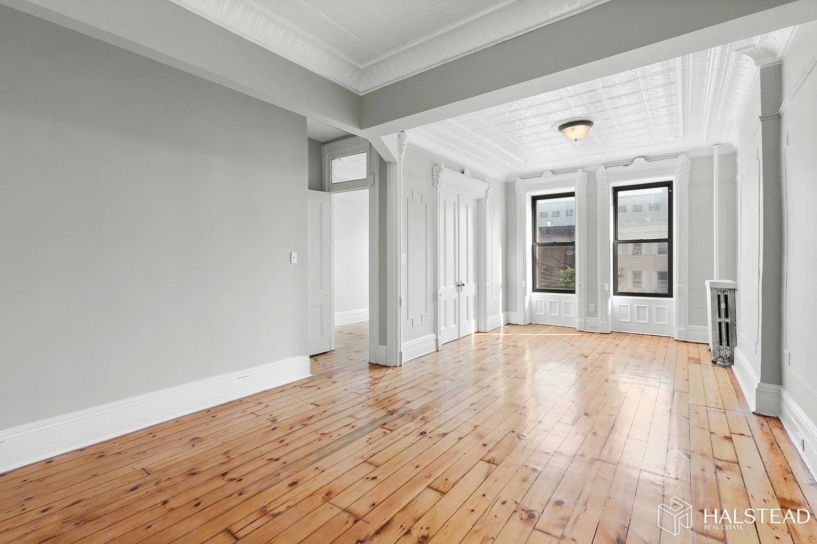 We are pleased to present this beautifully renovated 2BR floor thru.