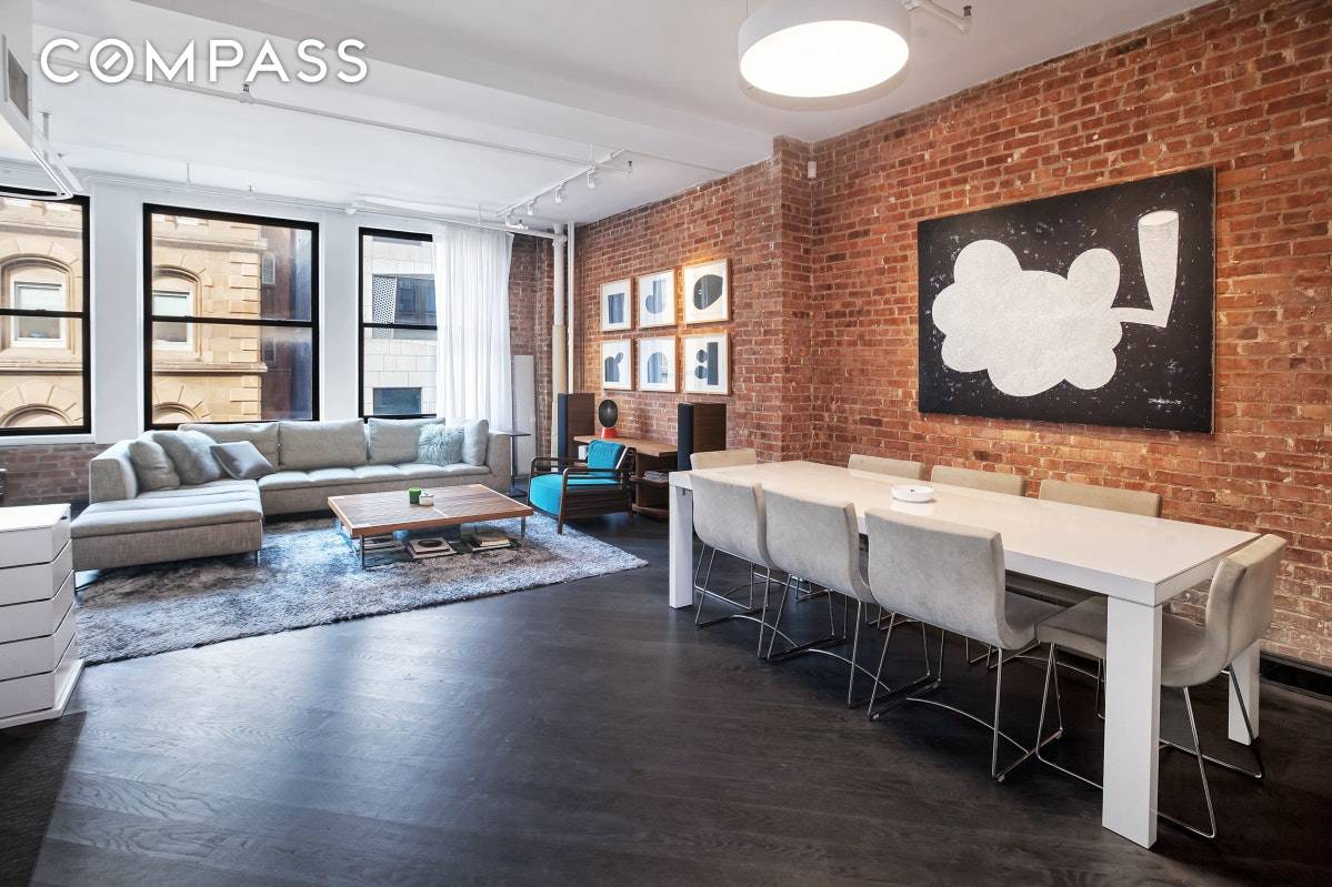 Enjoy true loft living in the Flatiron District in this stunning two bedroom, two bathroom co op featuring grand proportions, original details and chic contemporary design.