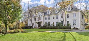 1 Harvest Lane, a quintessential New England Colonial situated on a well manicured 2 acre lot in Lower Weston.