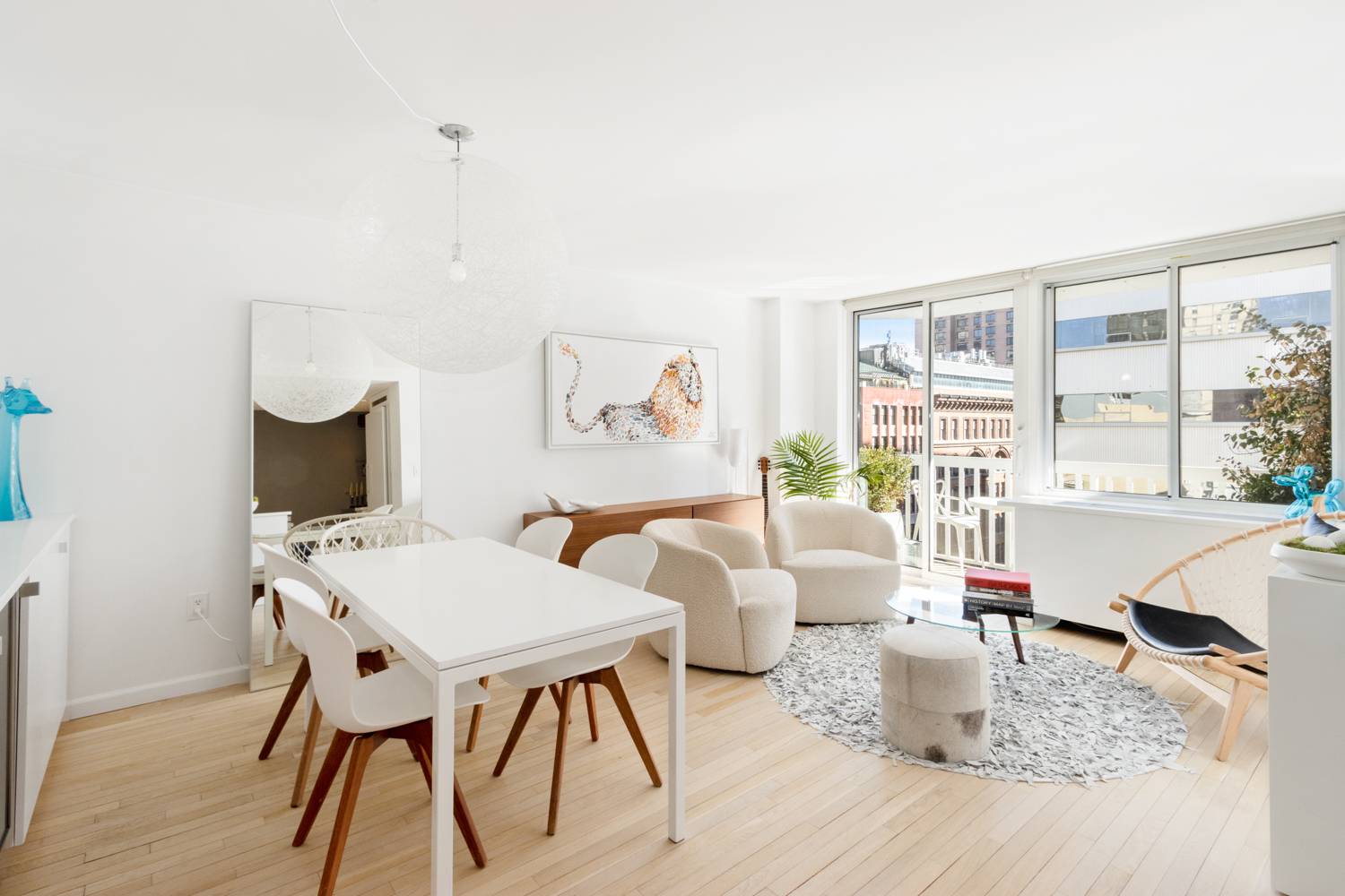 Newly Available ! Light filled open concept apartment right next to Madison square park with designer finishes and a light filled living space.