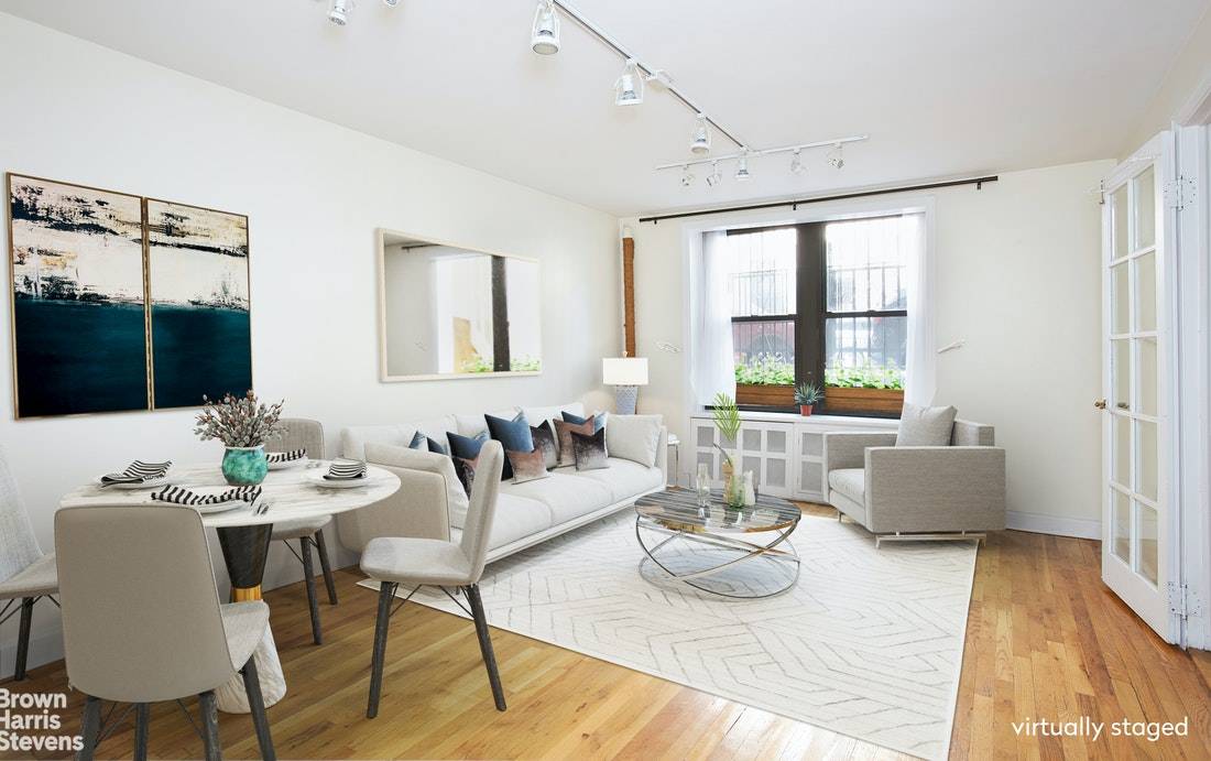Welcome to your warm and inviting one bedroom, one bathroom garden level apartment on a quiet Kips Bay street.