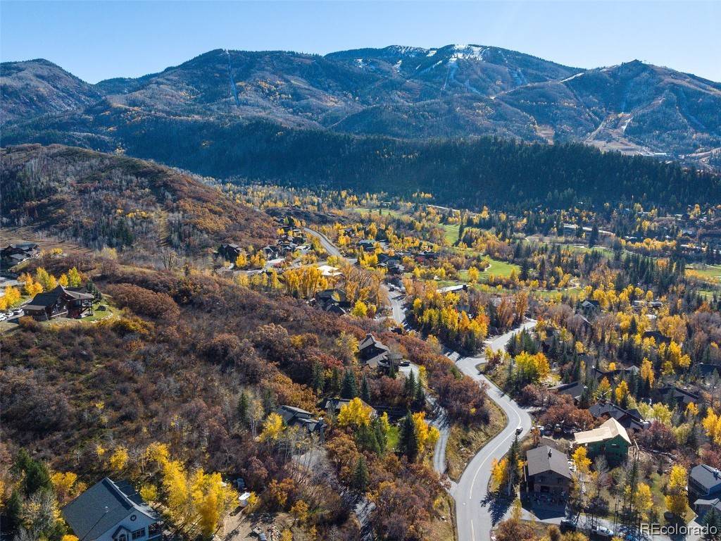 Offering a picturesque. 54 acre lot in Mountain View Estates in Steamboat Springs with captivating views of the Steamboat Ski Area, Emerald Mountain, the Flat Tops and surrounding valley.