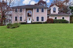 Expansive 5 bedroom 4 full bathroom colonial set on a beautifully landscaped 2 acre lot on a private cul de sac.