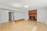 Another view of the lower level family room. 4th bedroom and home office are on the left.