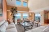 Panoramic views of the Hudson River and Mario Cuomo Bridge. Double-height ceilings.