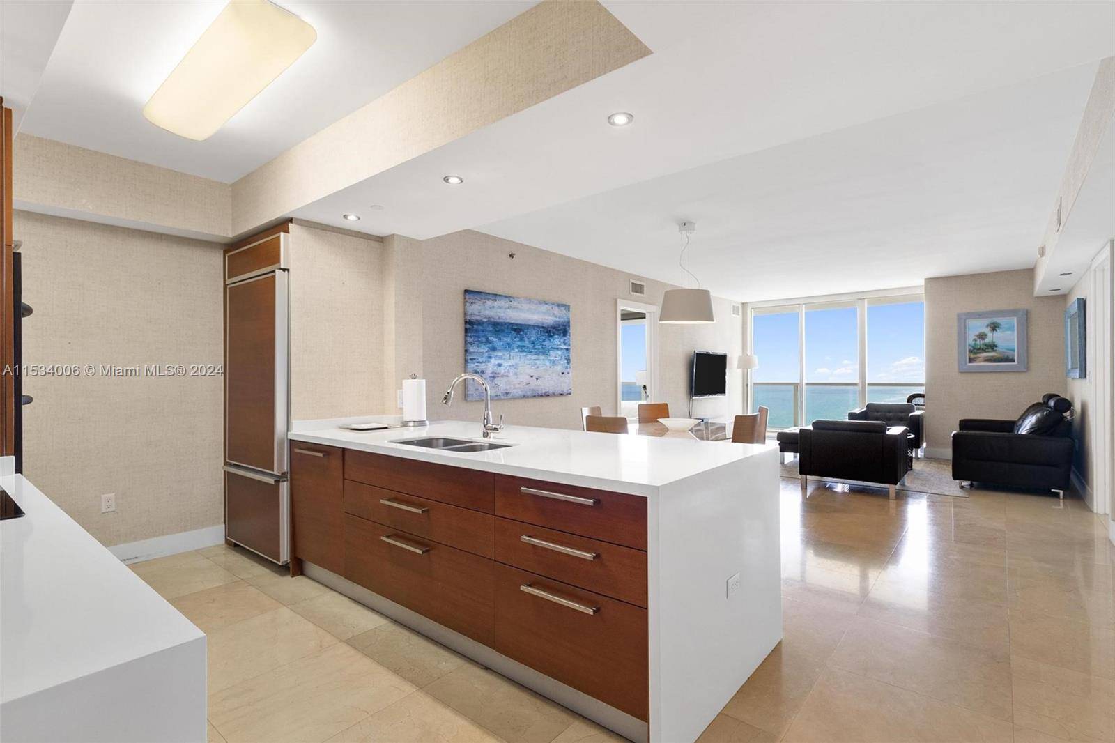 Furnished with elegance, this stunning residence offers breathtaking ocean and Intracoastal views.