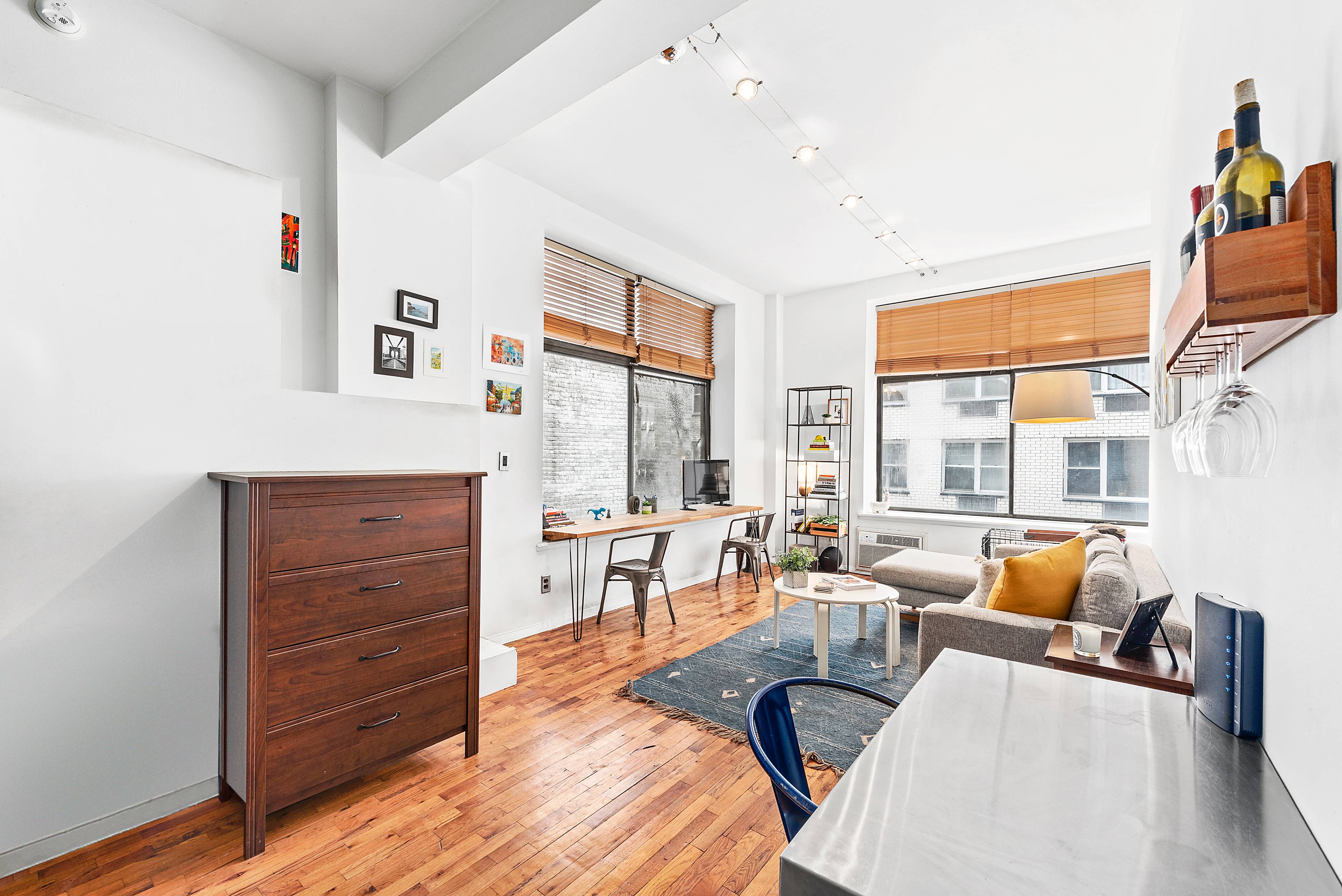This X Tra Large and Rare One Of A Kind stunning corner Loft features two oversized windows, with bright South and East exposures and soaring 11 foot ceilings !