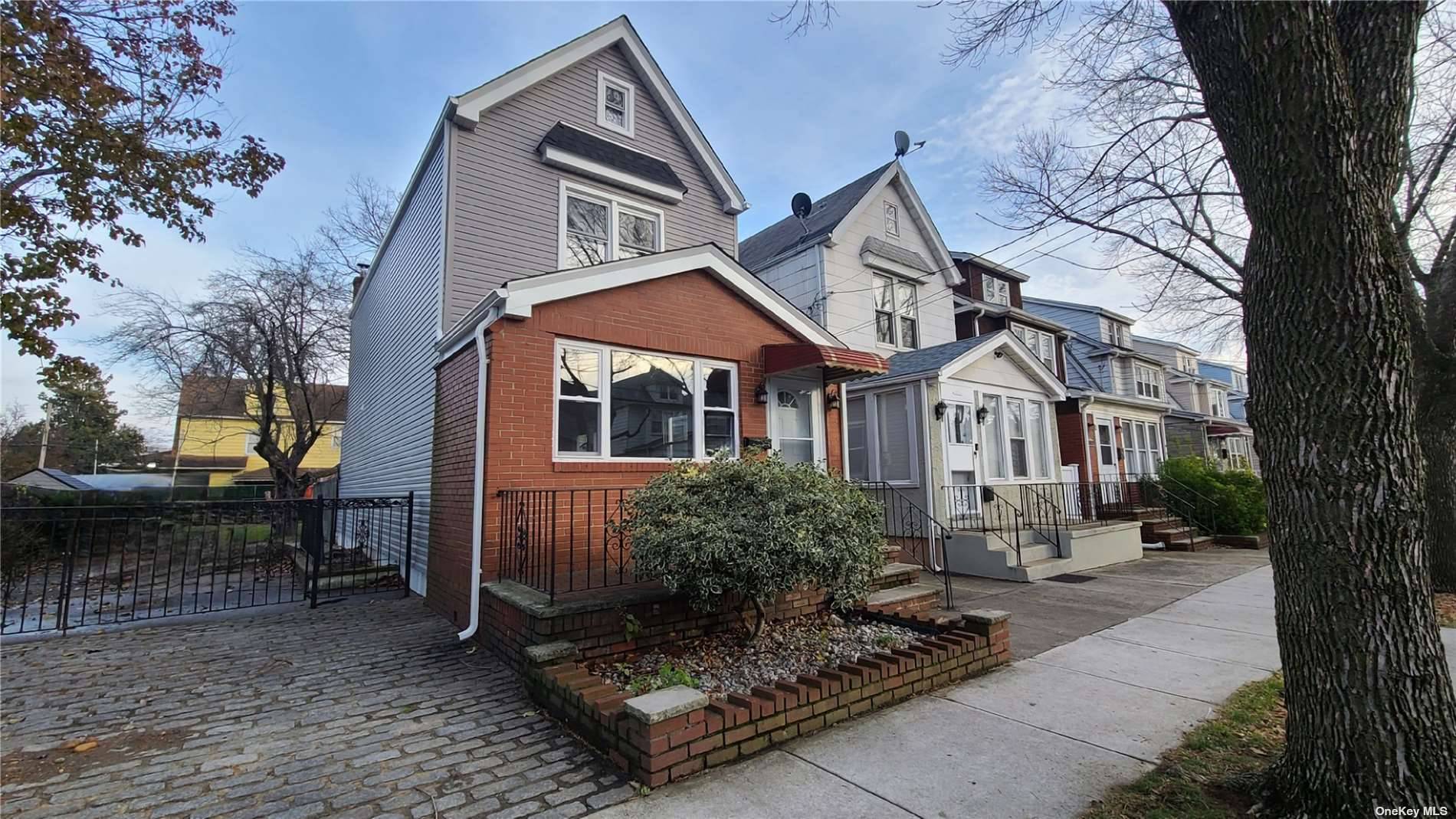 Welcome to a grand place to call home in Ozone Park.