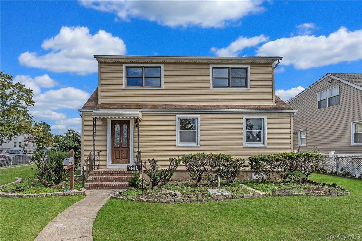 Spacious 4 Bedroom, 2 baths Home with New Siding, Garage, and Finished Basement Tons of Potential !