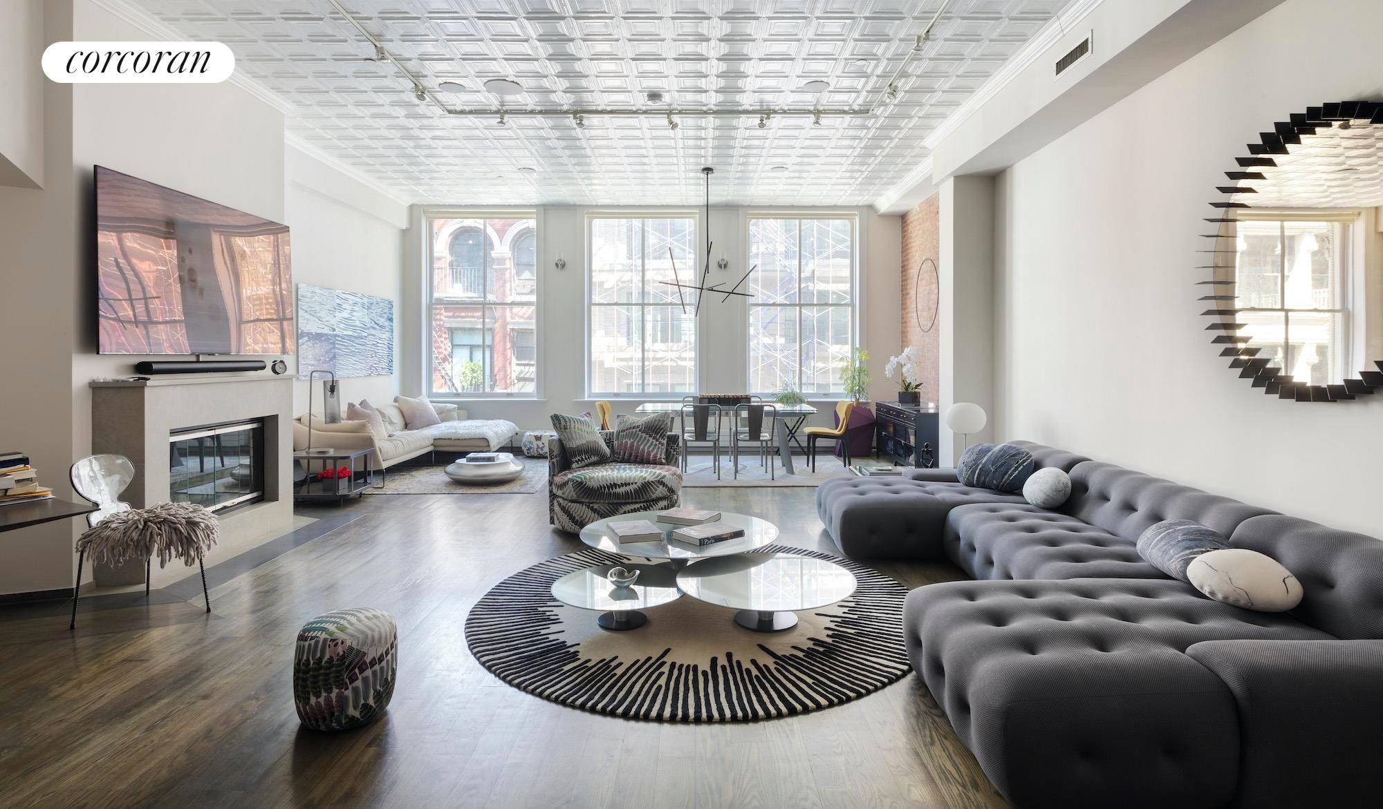 This downtown home with soaring ceilings is the definition of NYC loft living.