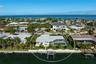 Situated on an 11,543 square foot lot with 100 feet of waterfrontage