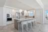 This residence has been completely designed by an interior designer - exquisite lighting fixtures and custom window treatment!