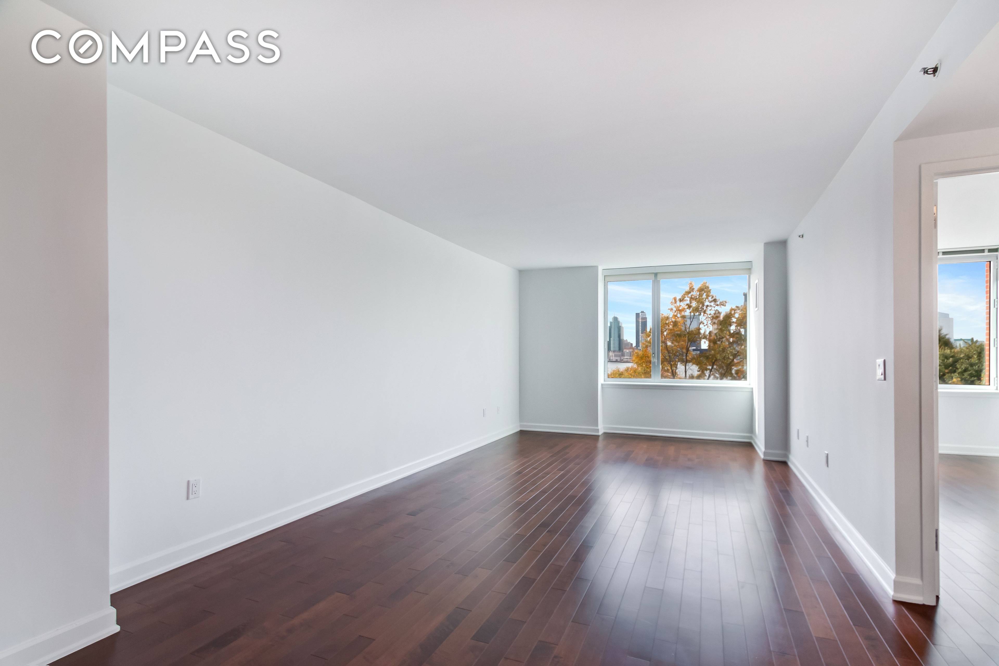 Enjoy Hudson River views and breathtaking sunsets in this sundrenched, spacious 885 sq.
