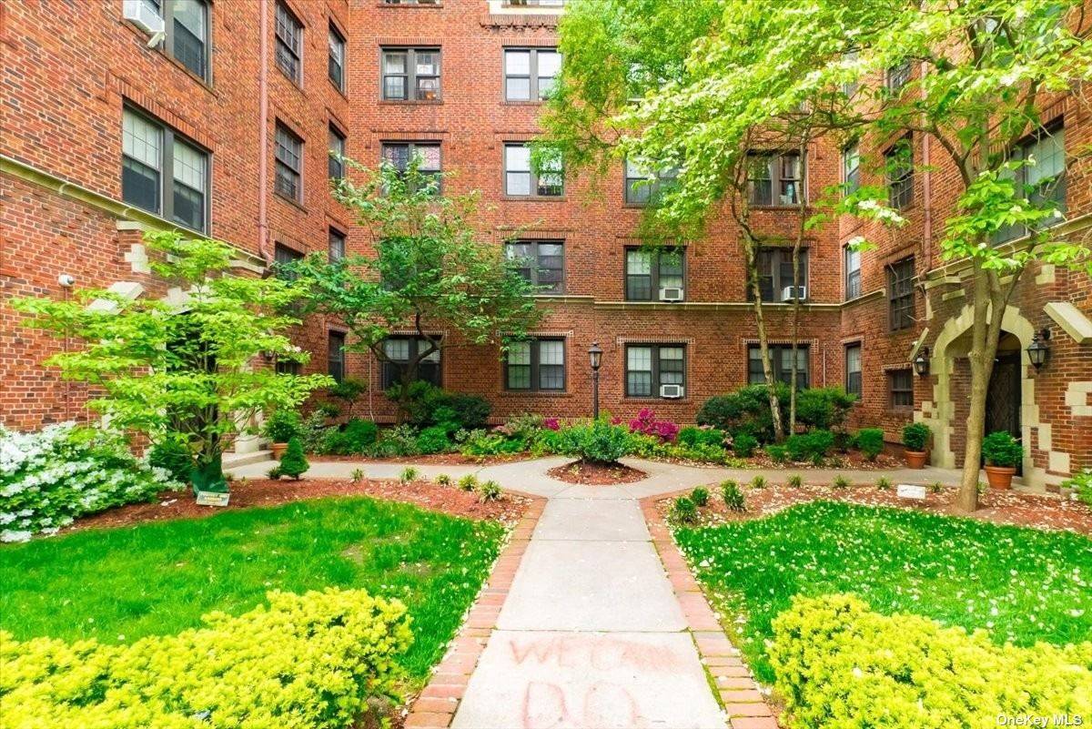 Exquisite, fully renovated top floor 2 Bedroom convertible to 3 bedroom, 1 bath coop at Chatwick Gardens, just outside of Forest Hills Gardens.