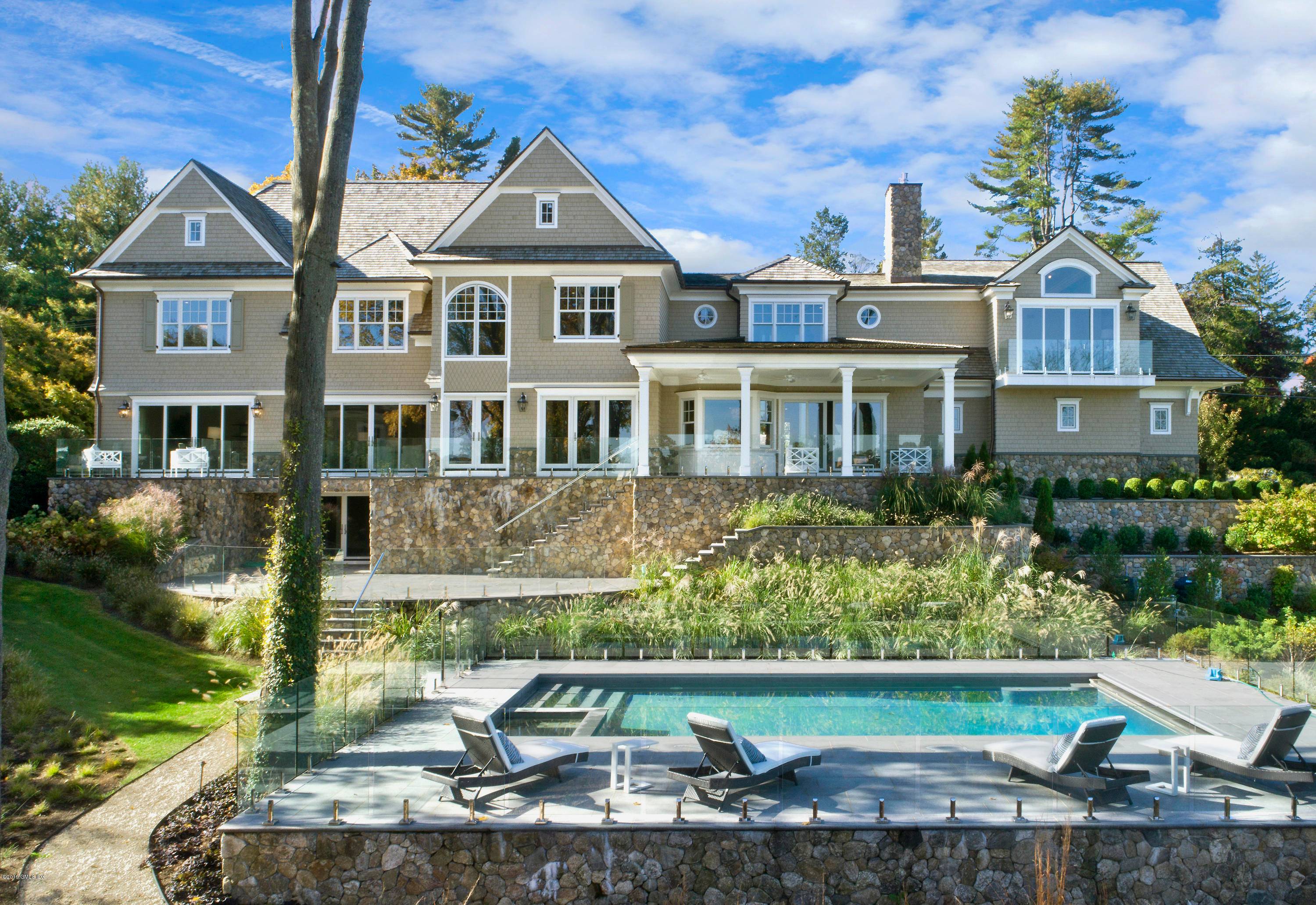 Masterful design meets modern luxury in this waterfront new construction.
