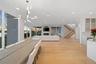 Dining area featuring light hardwood / wood-style floors and an inviting chandelier