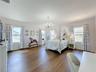 2nd primary suite upstairs with walk in closet and ensuite bathroom