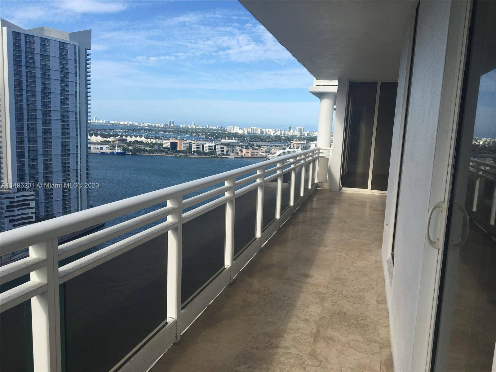 SPECTACULAR BAY VIEWS from this 27th floor apartment at the luxurious CARBONELL on exclusive Brickell Key !