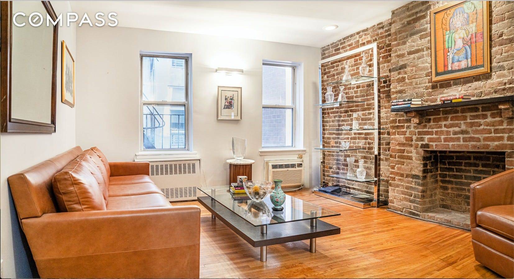 Charming Gramercy apartment with exposed brick walls.