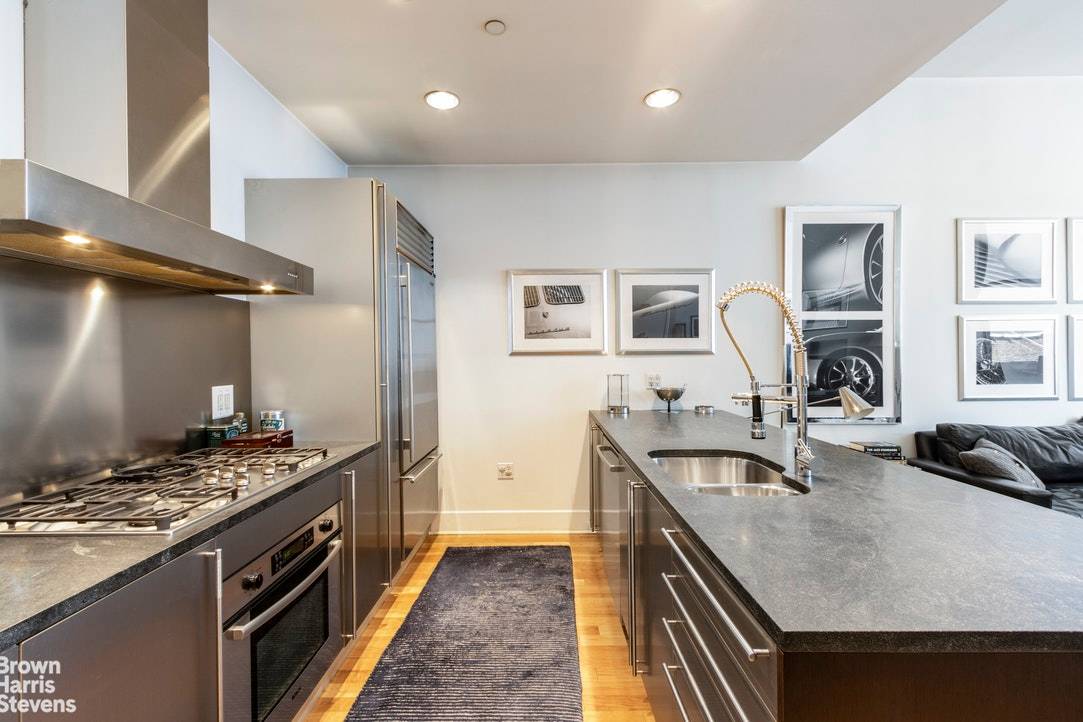 This is an extraordinary apartment stylish, large, and with a flexible layout in the famed Hit Factory building in Hell's Kitchen.