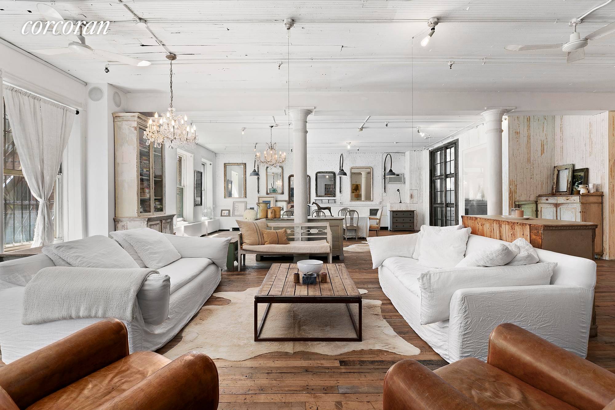 Located at 80 Wooster Street, SoHo's original co op and converted Renaissance warehouse, this breathtaking artist's loft exudes architectural details.