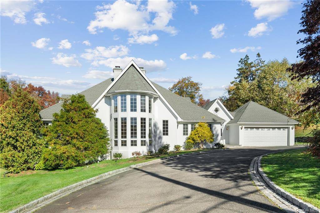 Fabulous Contemporary within the prestigious Knollwood Country Club setting.