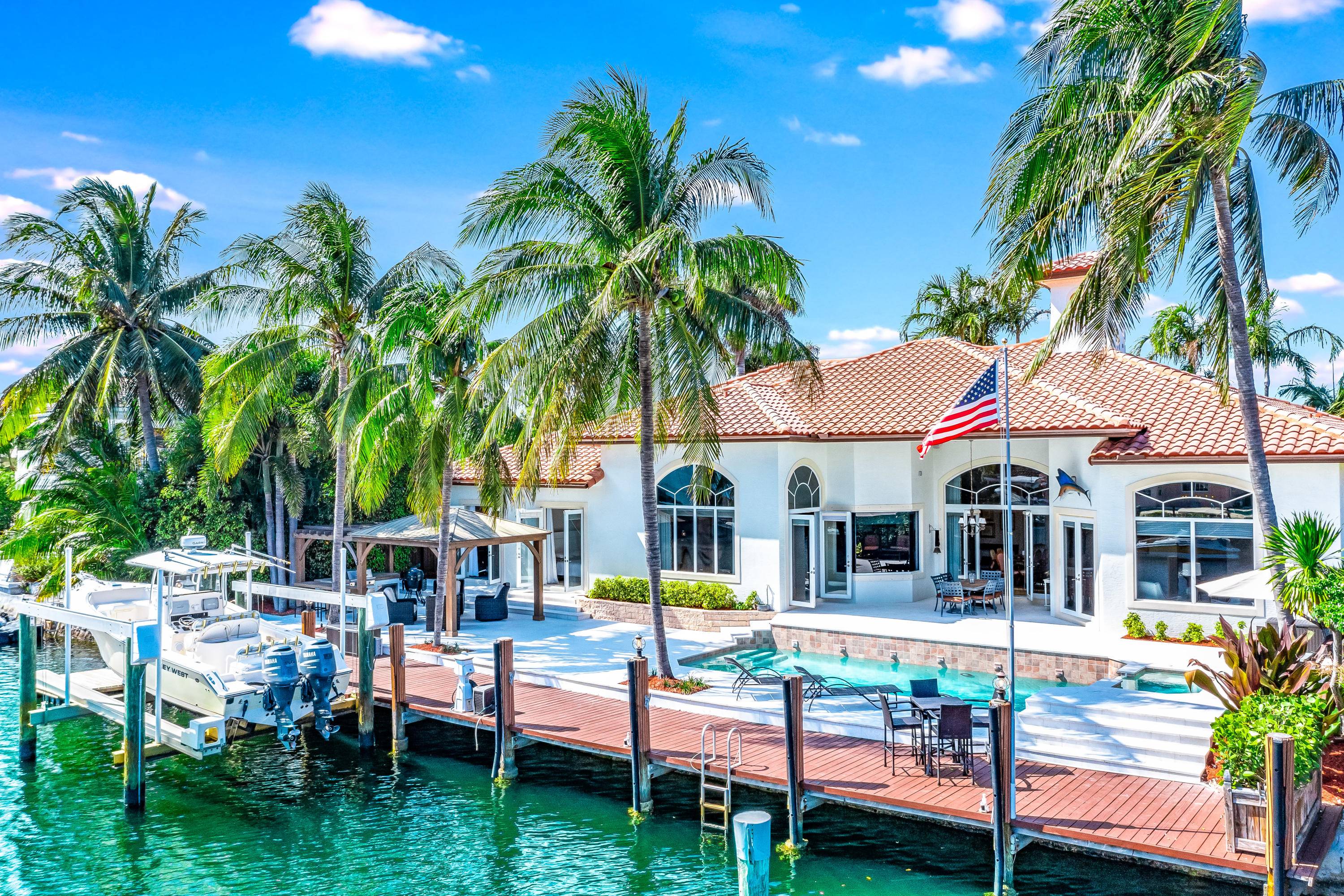A BOAT LOVERS DREAM ! Nestled in the exclusive enclave of Lighthouse Point on an island street and just a ten minute boat ride from the iconic Hillsboro Inlet Lighthouse.
