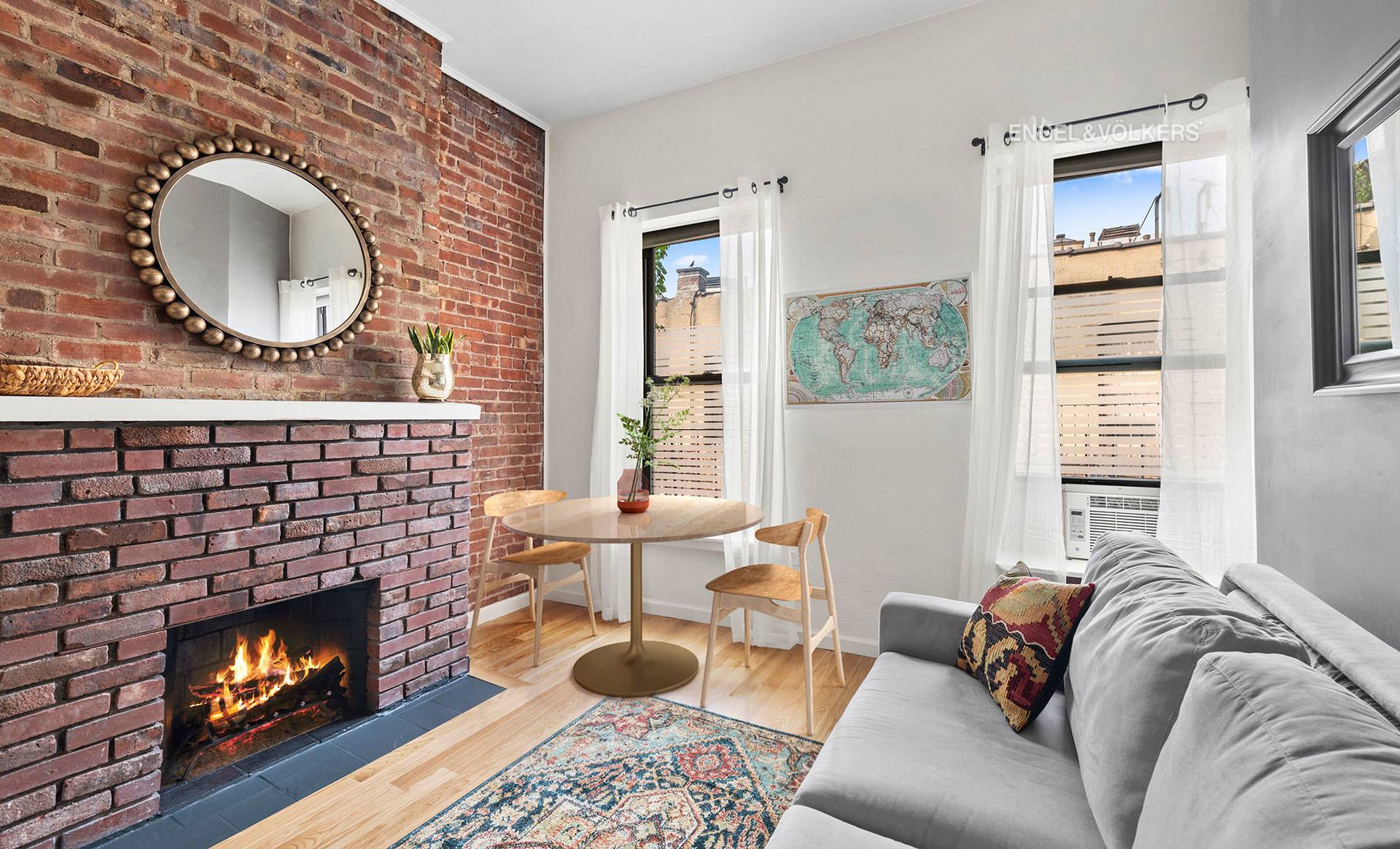 Perched on picturesque, tree lined Jane Street, Apartment 5C offers quintessential West Village charm with 11 ft ceilings, a rare wood burning fireplace, and sun filled skyline views.