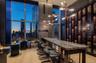 Wine cellar featuring light wood finished floors