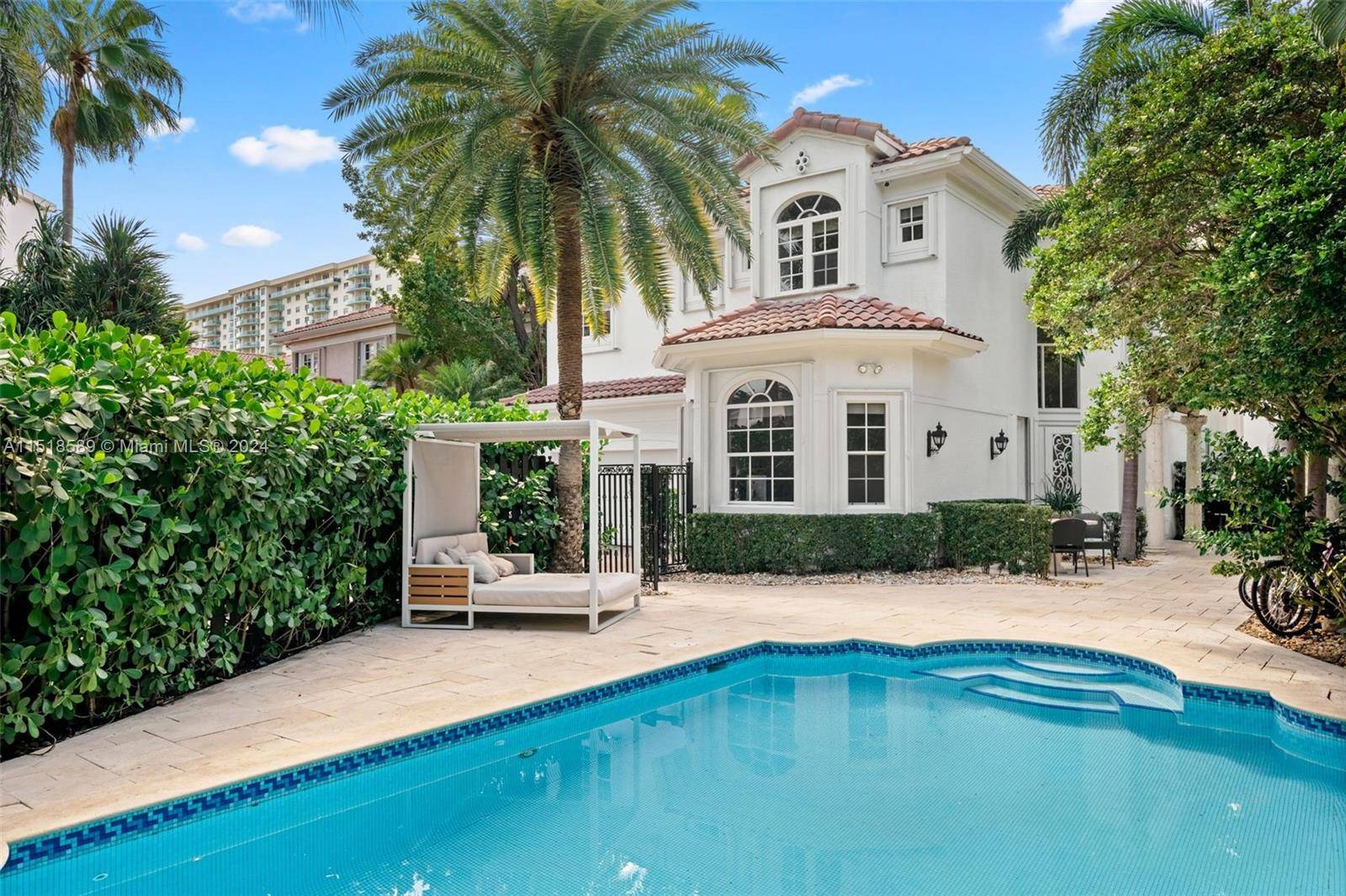 Located on an oversized corner lot, this very private residence has 6 bedrooms and 4.