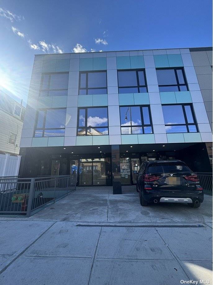Brand new gorgeous glass mixed use for lease.